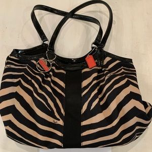 Coach tan and black zebra striped purse